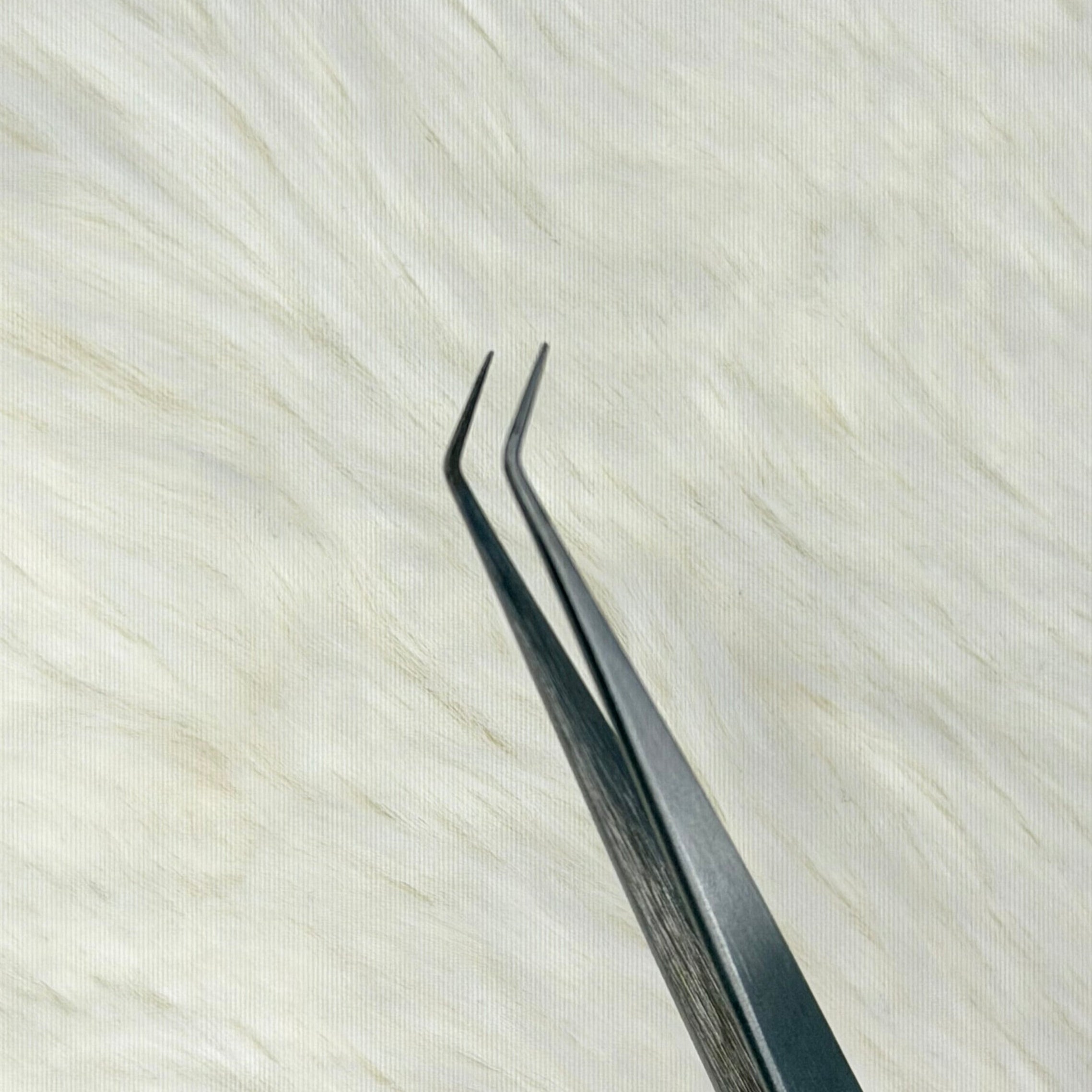 Lady isolation tweezer